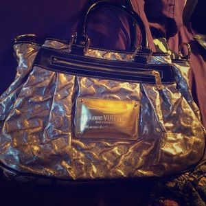 Gold LV bag leather luxury